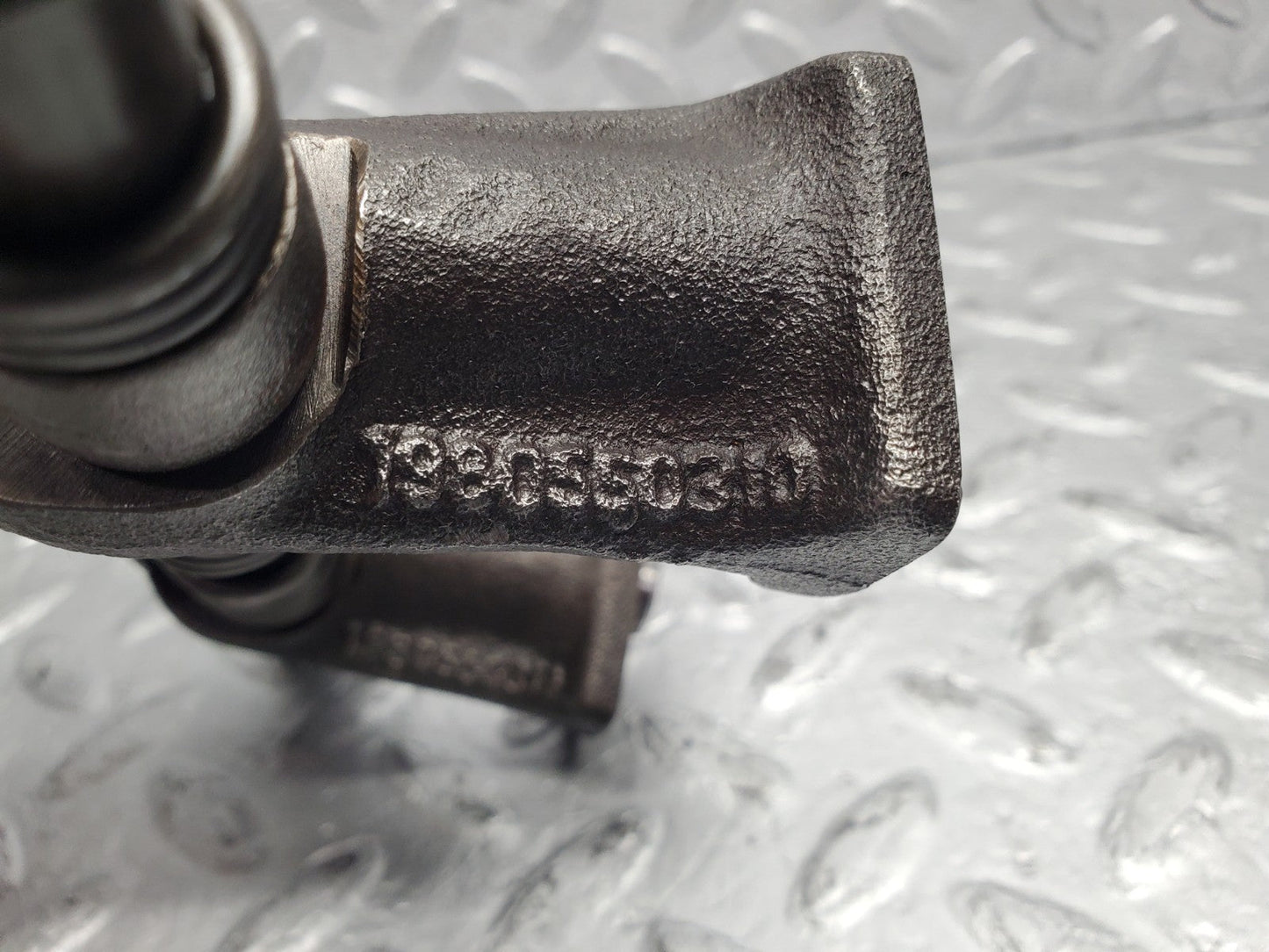 W112 rocker arm support with arm and shaft used OEM