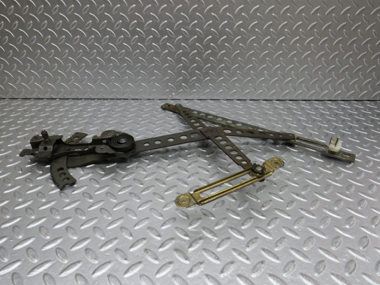 31140 Mercedes-Benz W123 200D Front Left Manual Window Regulator 1237200346