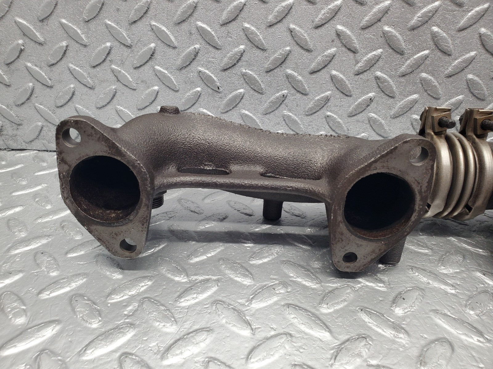 W126 Coupe exhaust manifold left used OEM