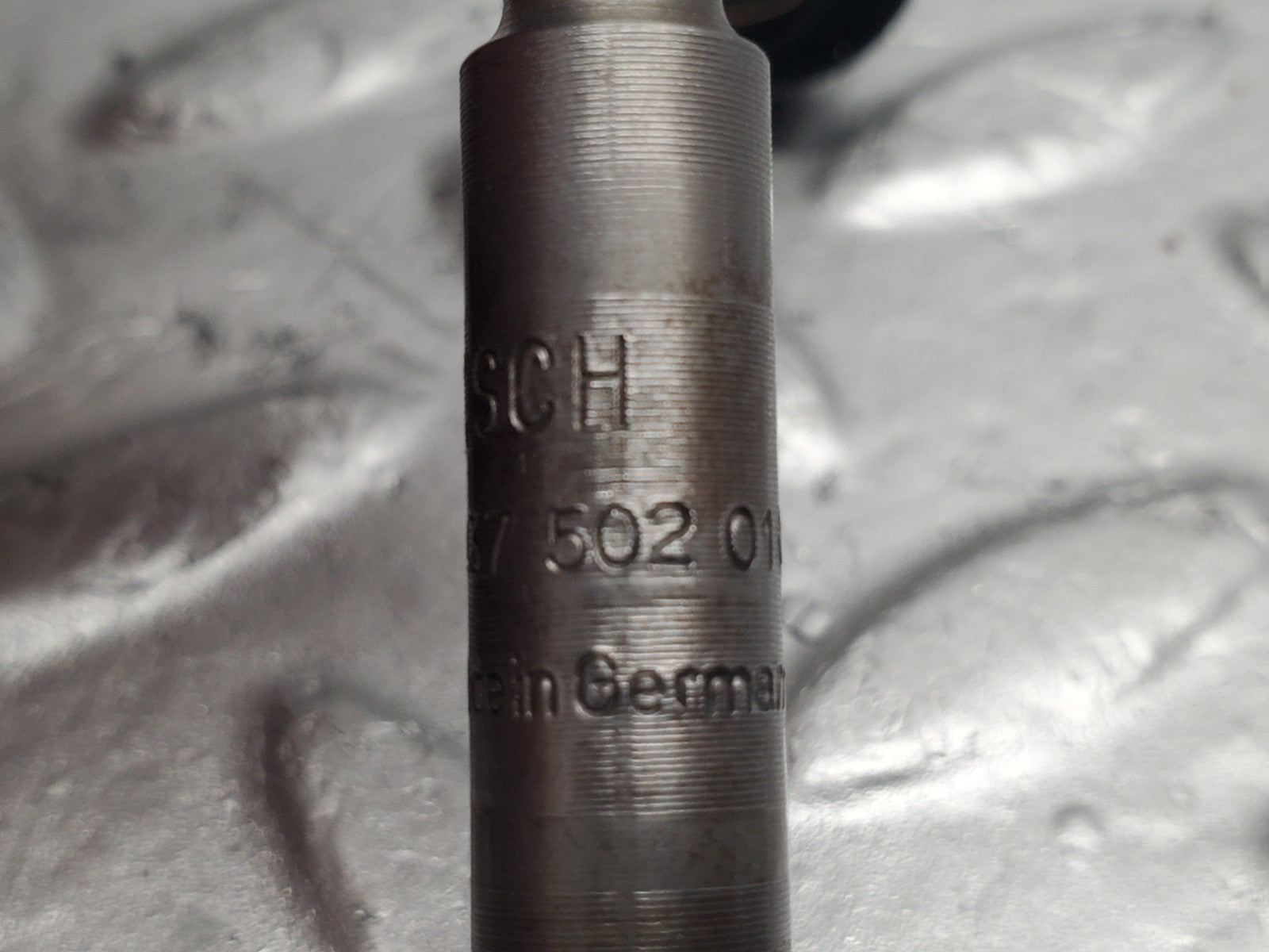 47332125