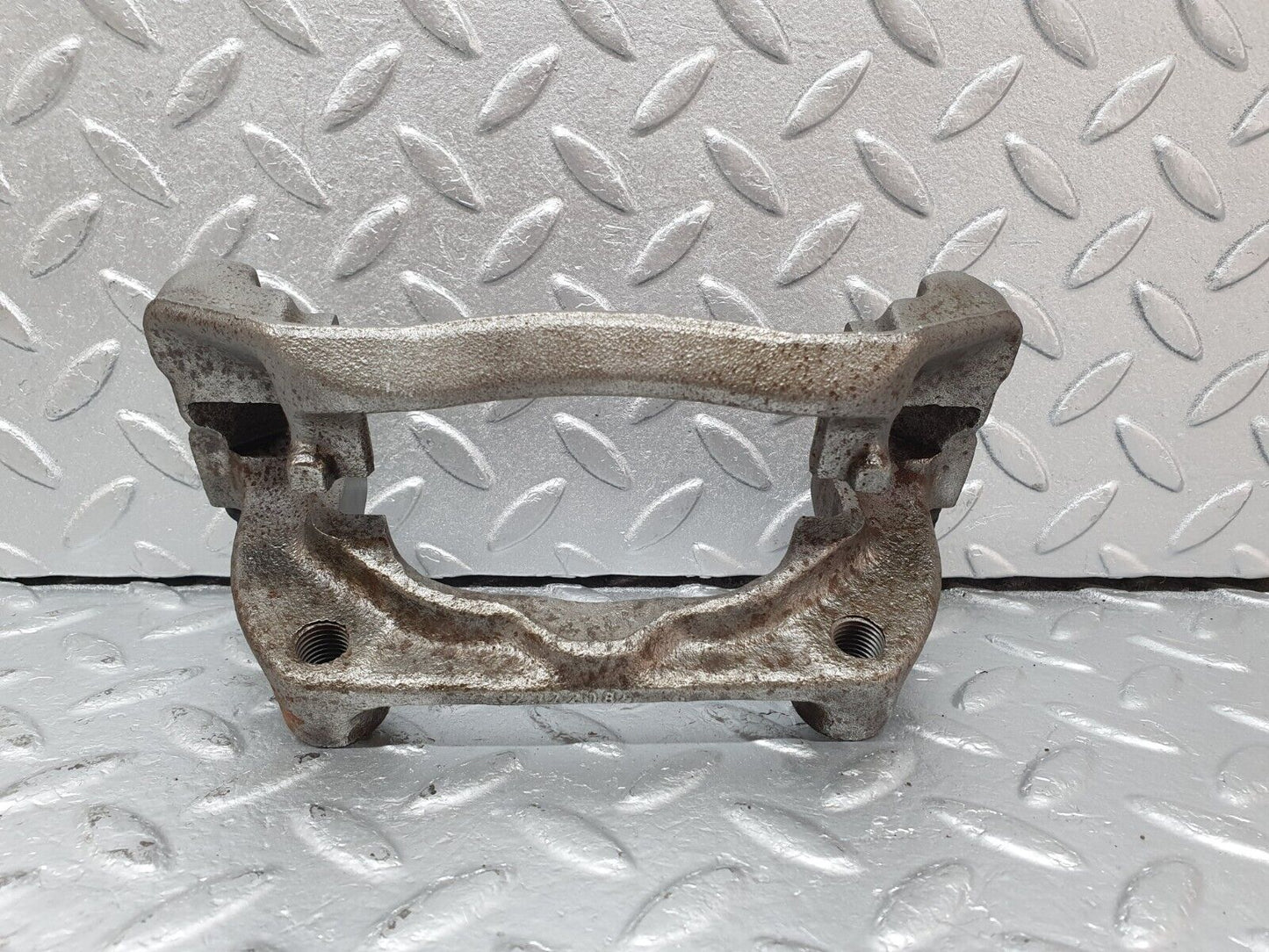41612 Mercedes-Benz W124 200E Front Left Brake Caliper Bracket