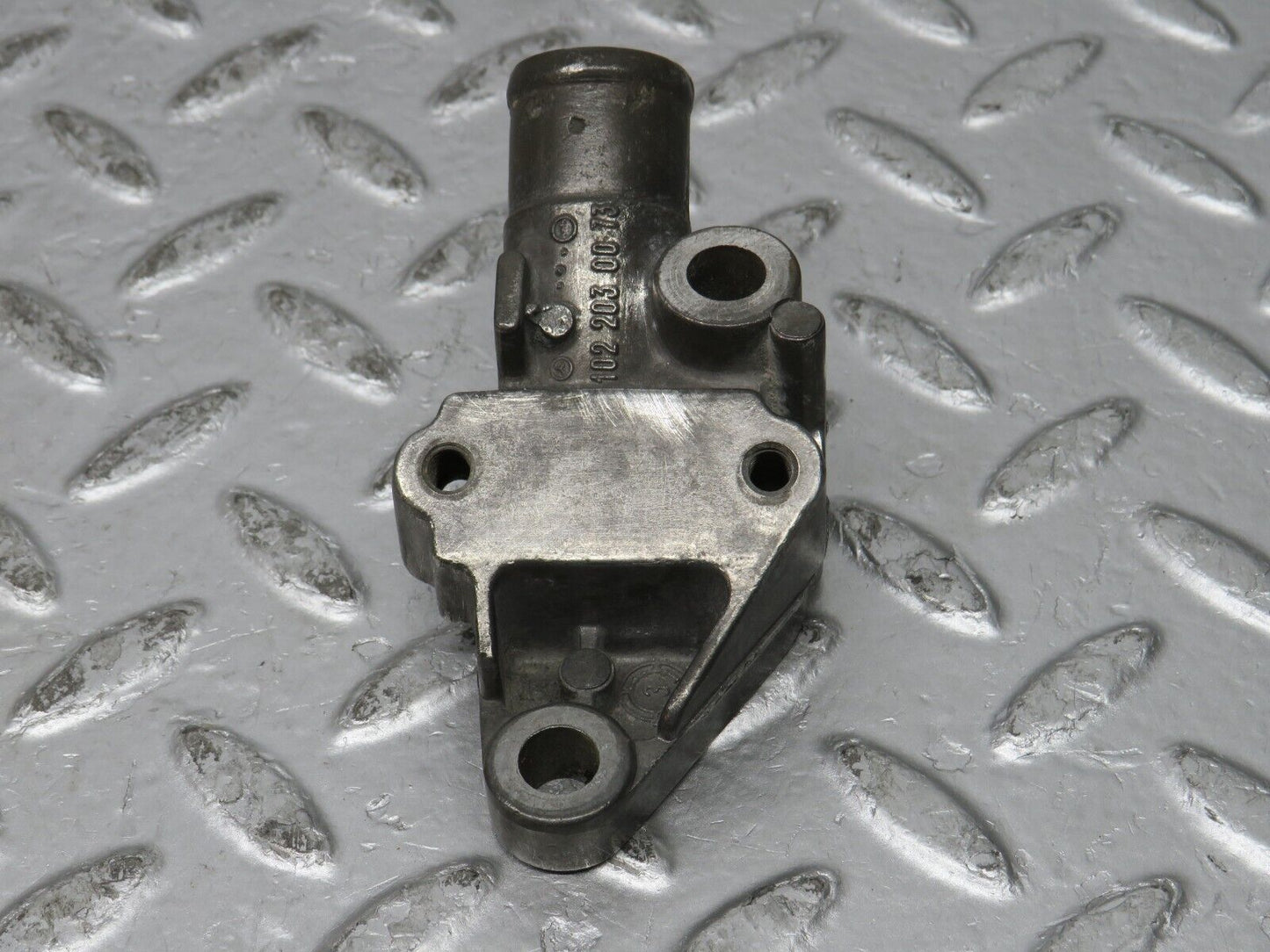 32058 Mercedes-Benz W123 230E Cooling Water Pump Housing Flange 1022030073