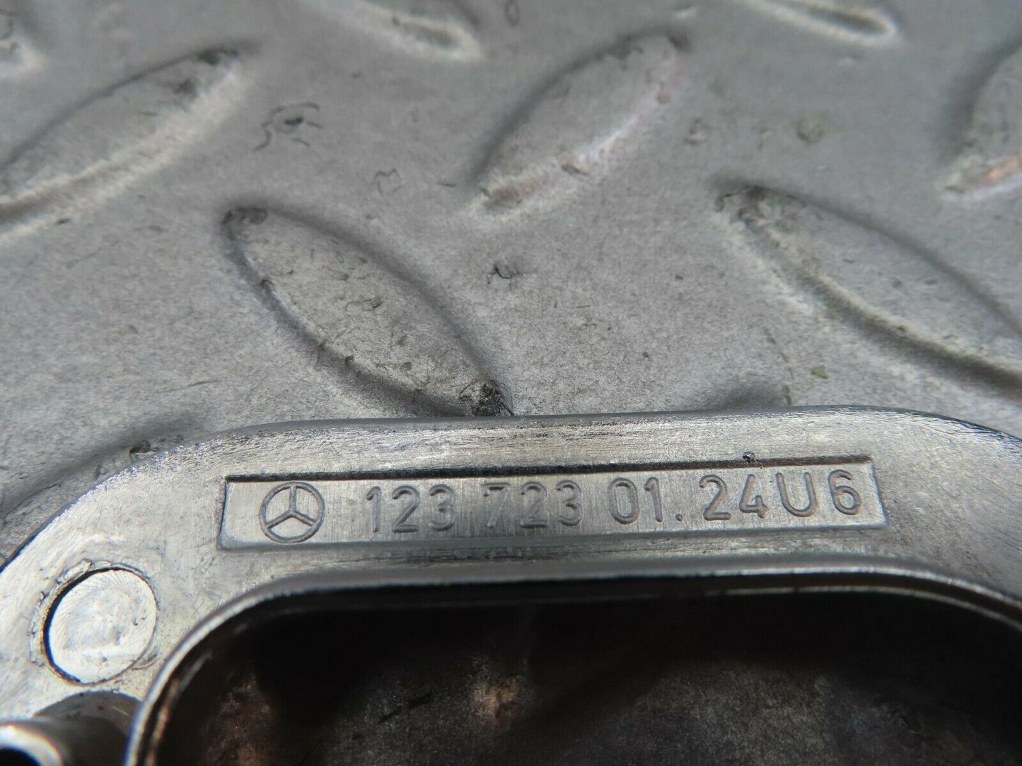 8723 Mercedes-Benz W123 Left Interior Chrome Door Latch Trim 1237230124