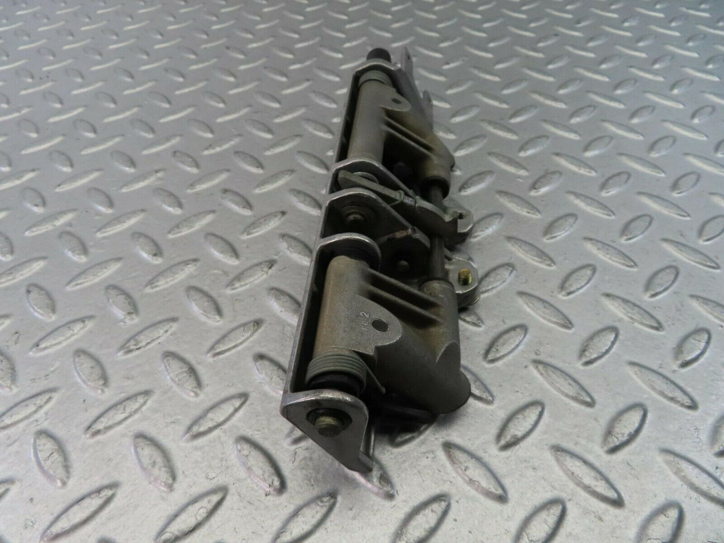 9319 Mercedes-Benz C124 300CE Coupe Headrest Folding Mechanism 1249700025