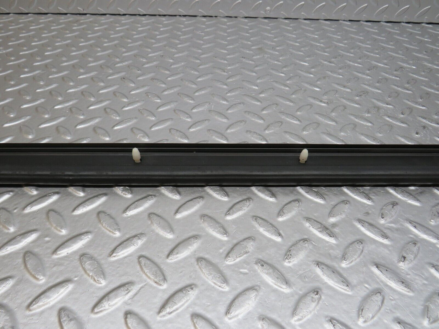 34220 Mercedes-Benz W124 260E Door Lower Sealing Rubber Trim Left