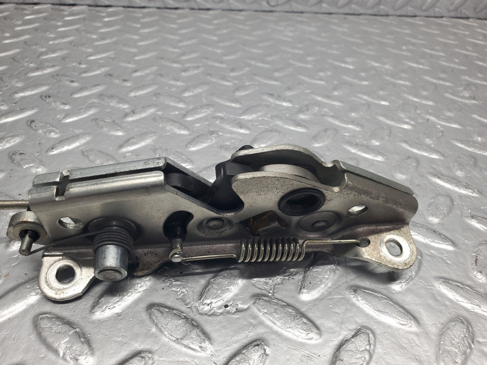 W124 Wagon rear left seat bench locking mechanism used OEM