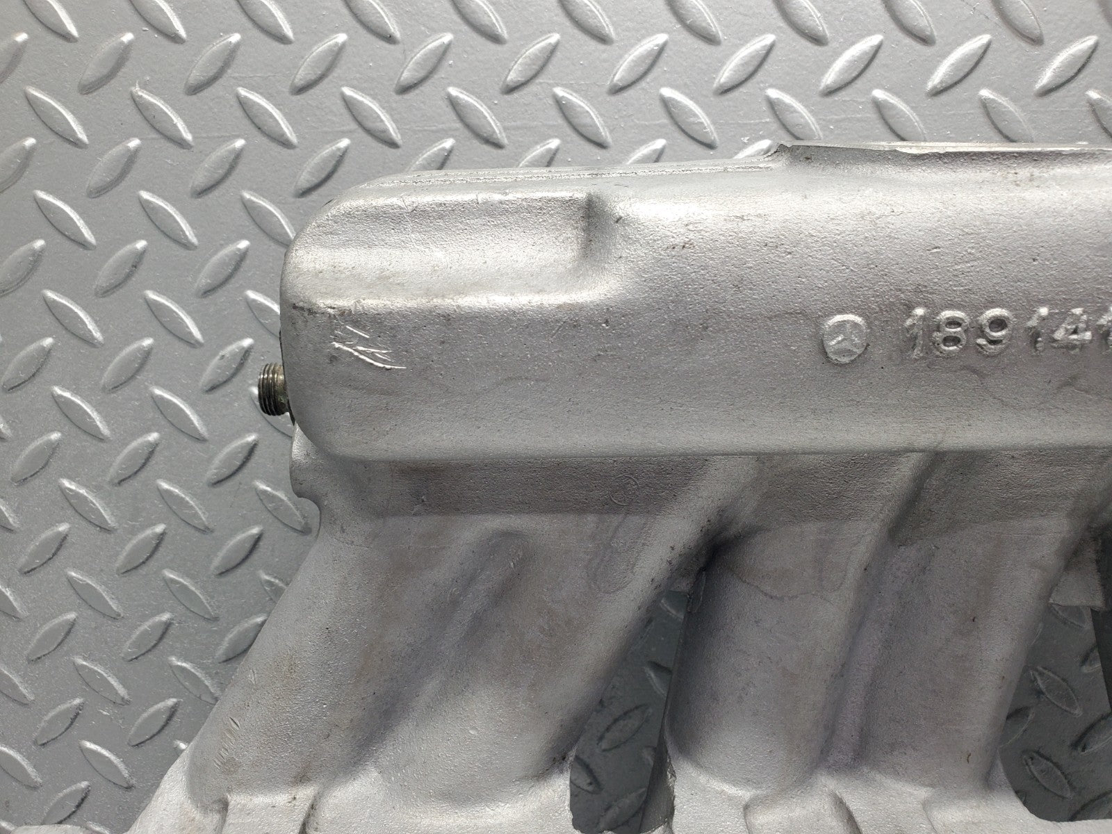 W112 intake manifold used OEM