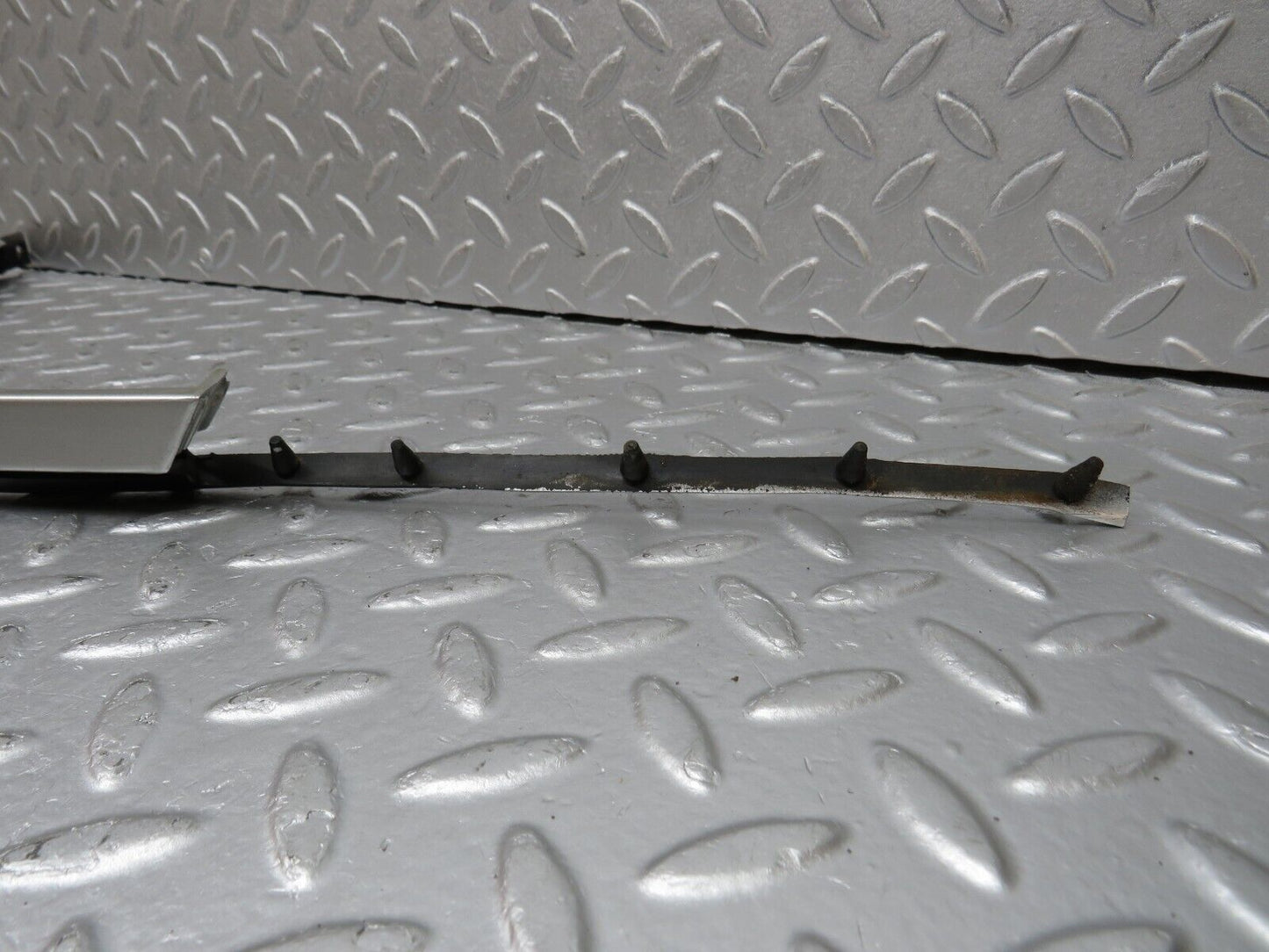 39695 Mercedes-Benz R129 320SL Coupe Left Headlight Lower Trim 1298260577 1298260777
