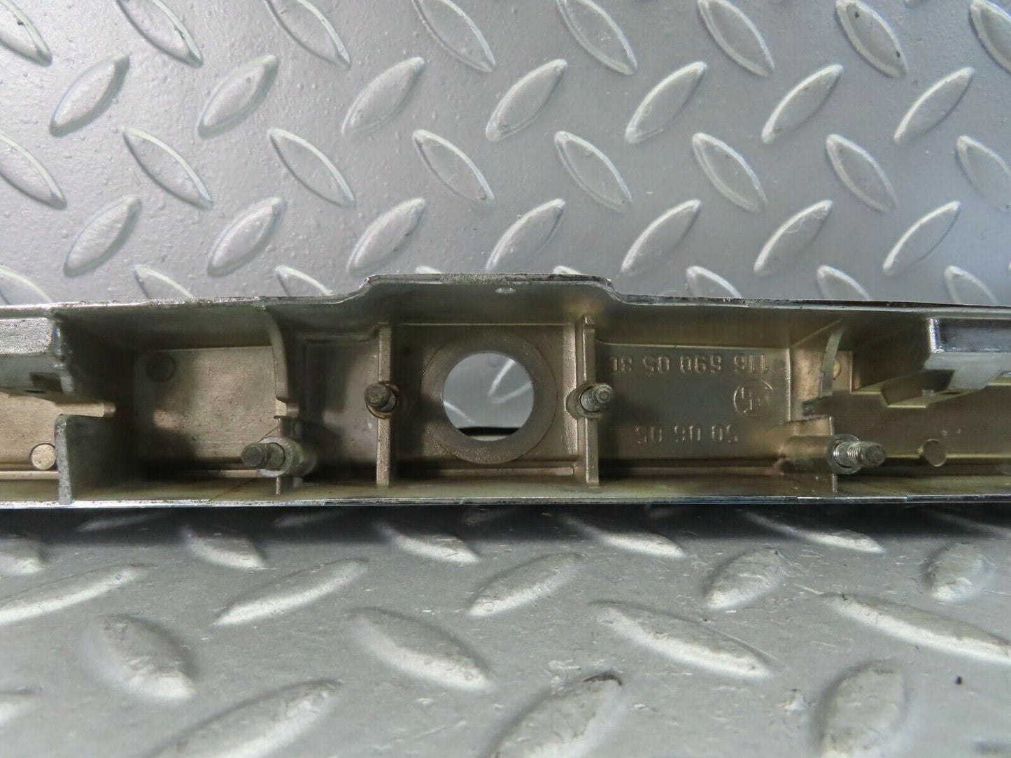 10299 Mercedes-Benz W116 number Plate Light Holder Chrome Moulding 1166900580