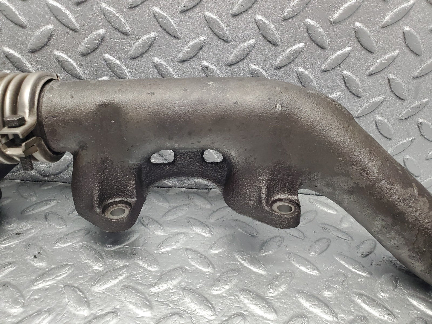 W126 Coupe exhaust manifold left used OEM