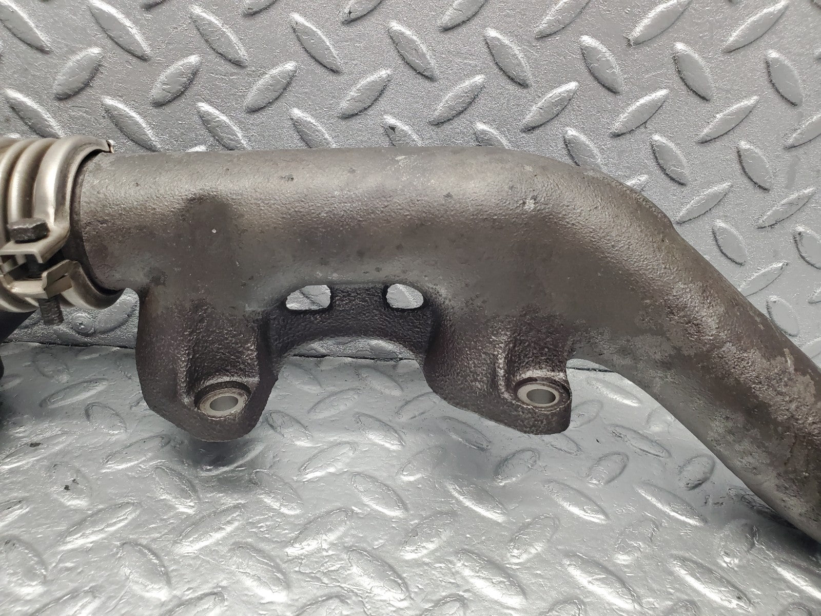 W126 Coupe exhaust manifold left used OEM