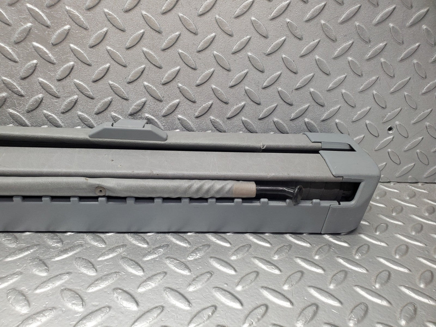 W124 Wagon trunk roll compartment cover used OEM