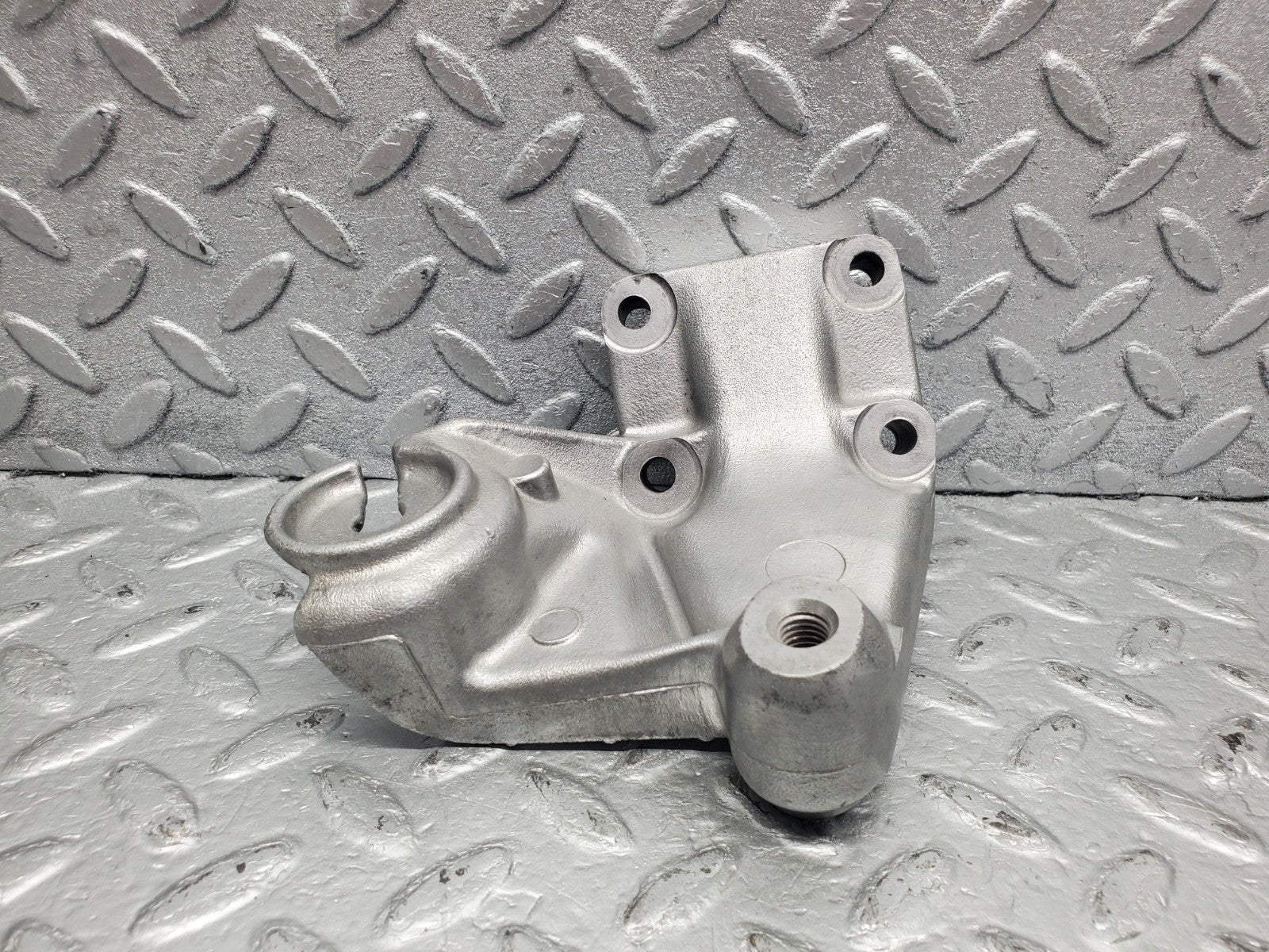 W126 Coupe engine mount bracket right used OEM