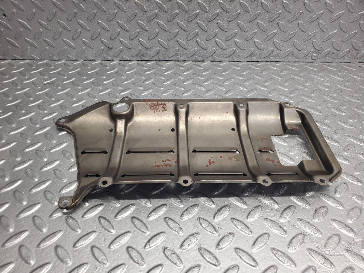 W124 Wagon baffle plate used OEM