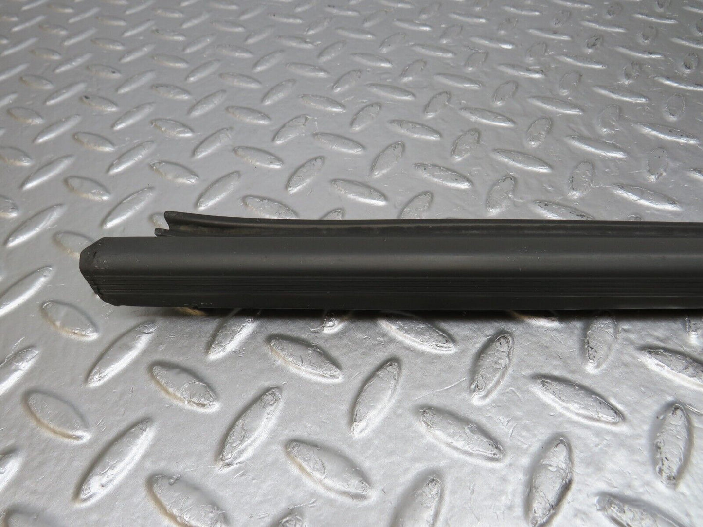 34220 Mercedes-Benz W124 260E Door Lower Sealing Rubber Trim Left
