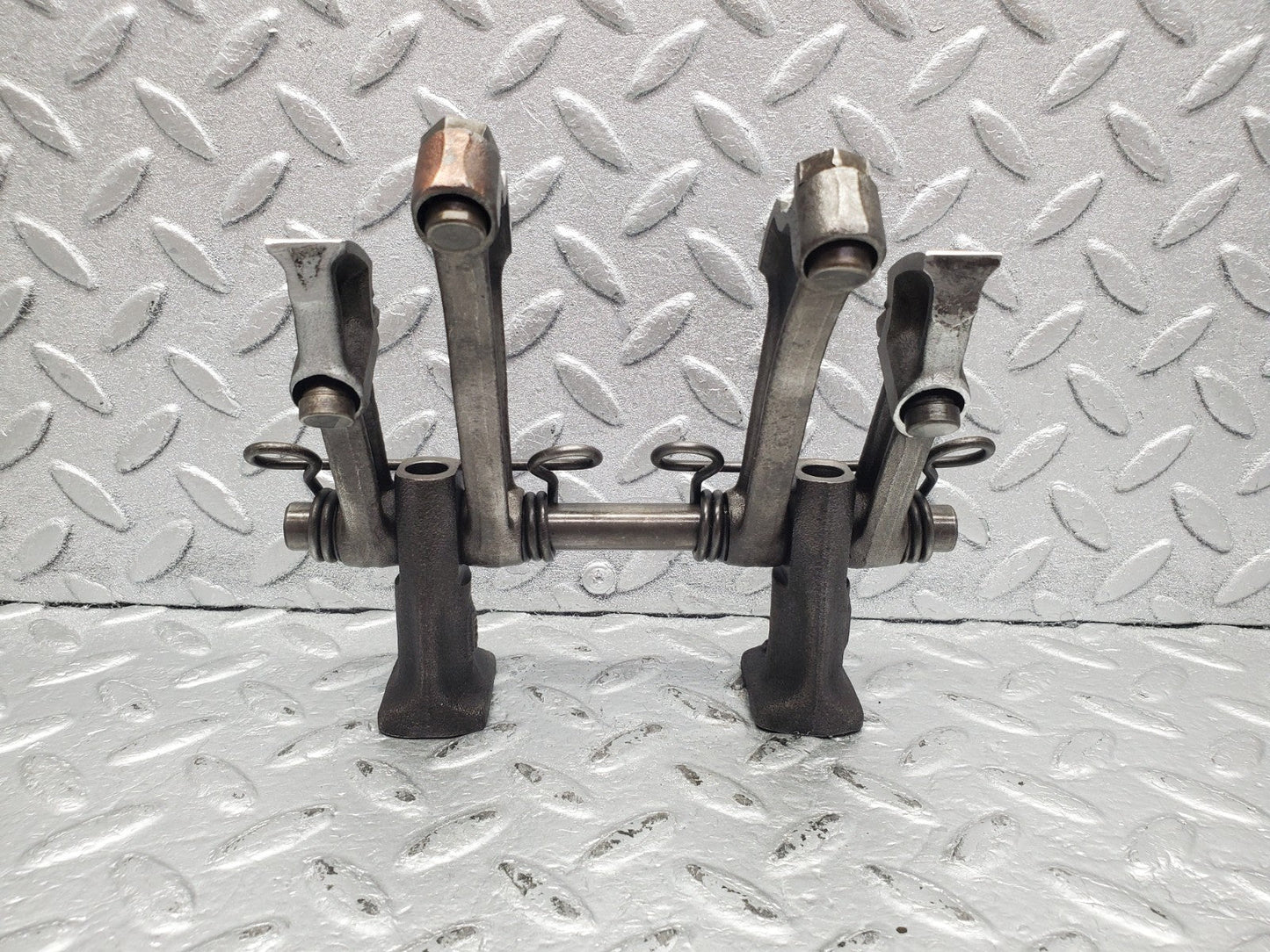 W112 rocker arm support with arm and shaft used OEM