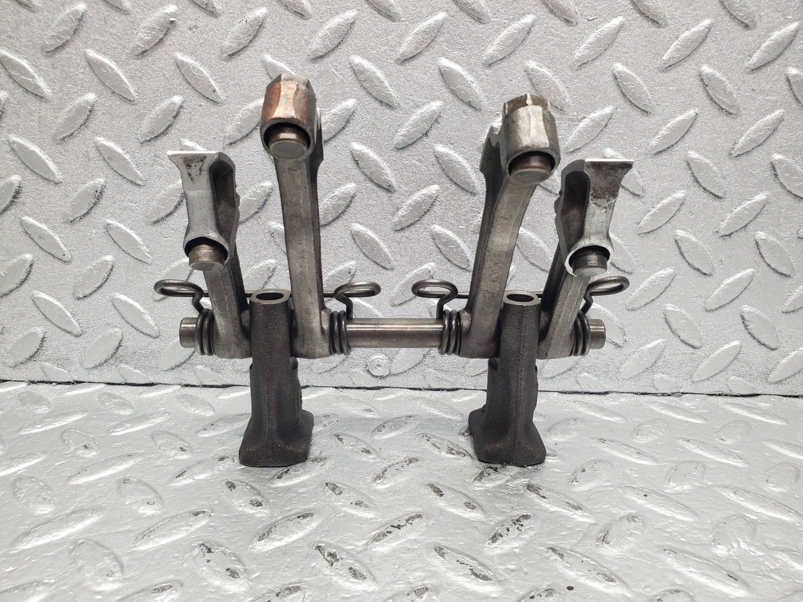 W112 rocker arm support with arm and shaft used OEM