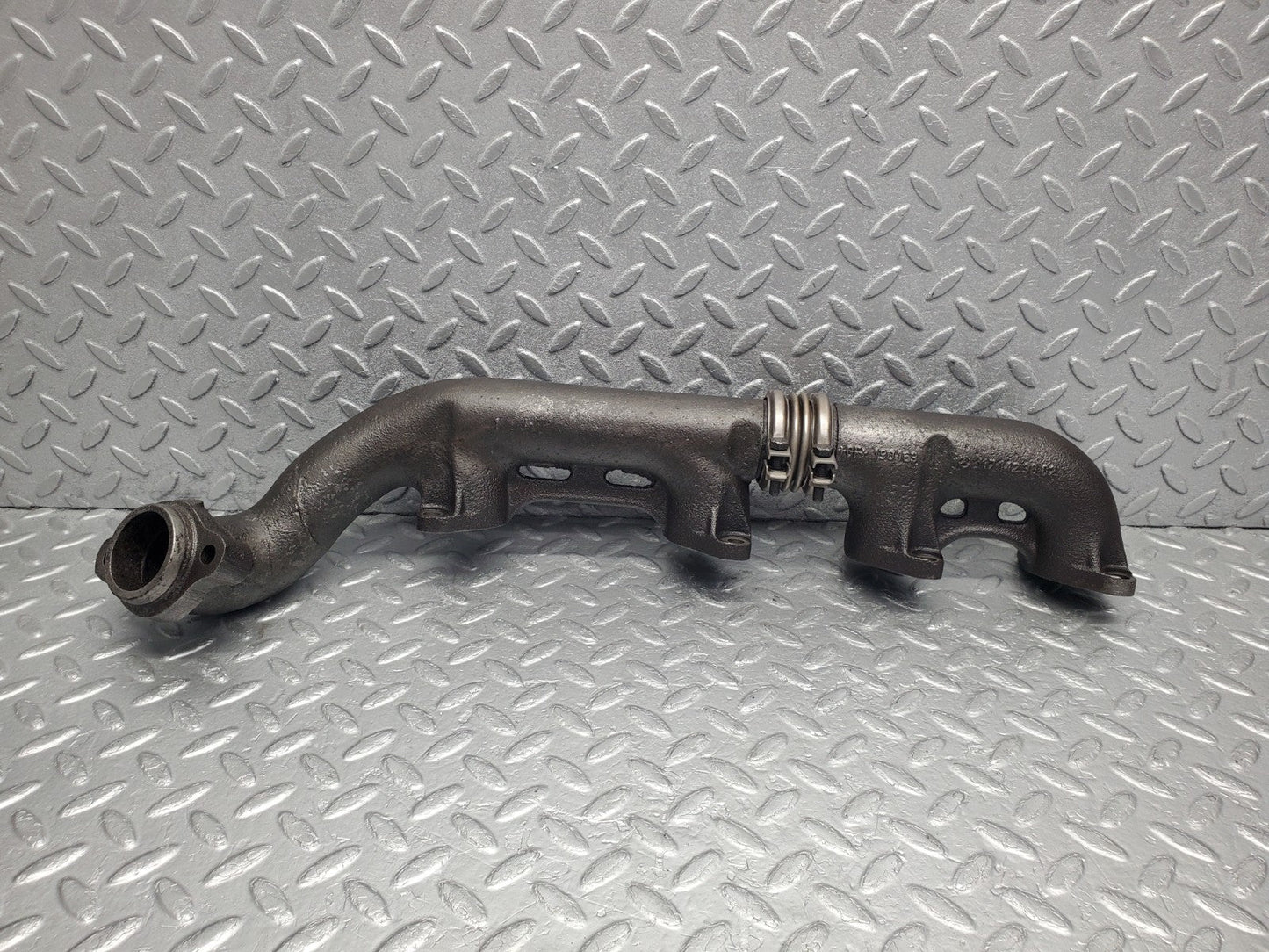 W126 Coupe exhaust manifold right used OEM