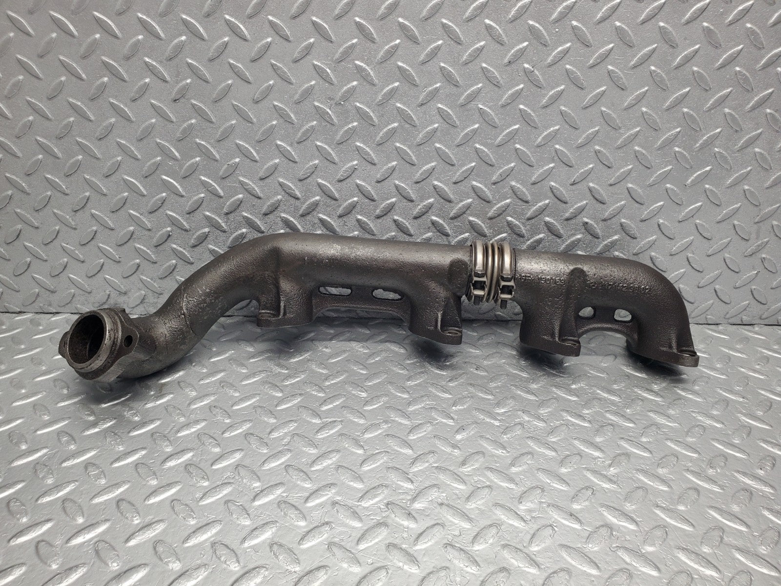 W126 Coupe exhaust manifold right used OEM