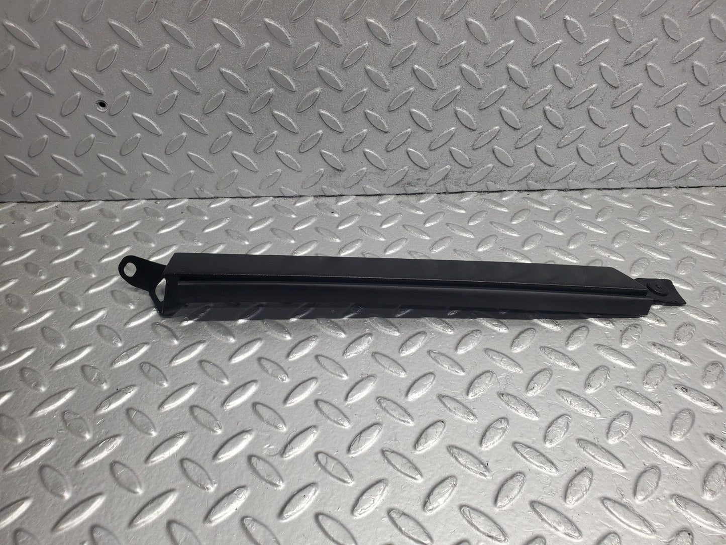 W124 Wagon under headlight trim right side used OEM