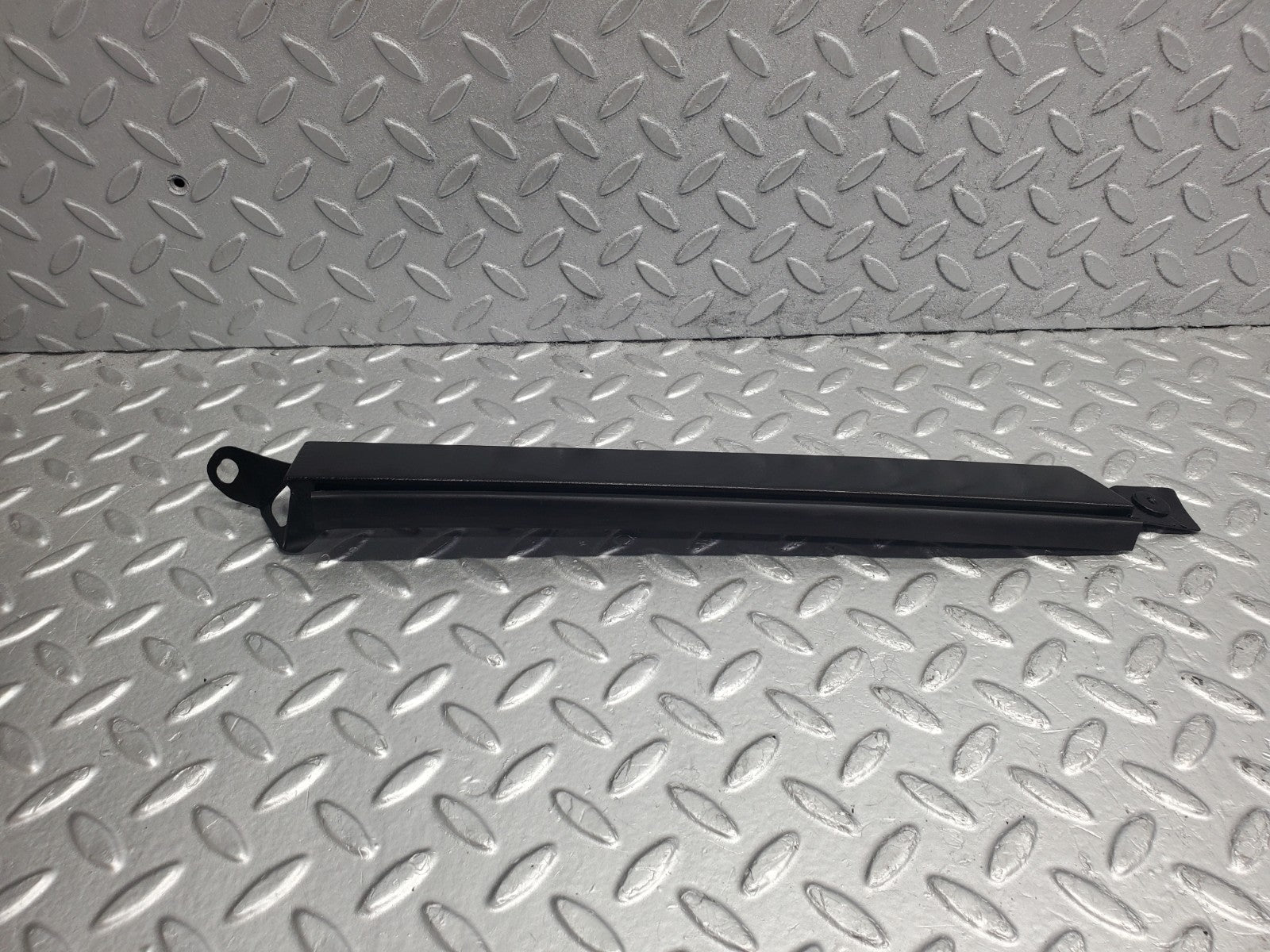 W124 Wagon under headlight trim right side used OEM