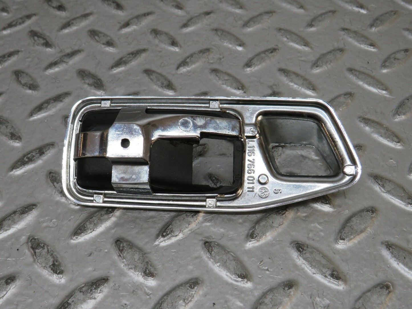28810 Mercedes-Benz W123 230E Chrome Frame For Door Opener  Left 1167660111