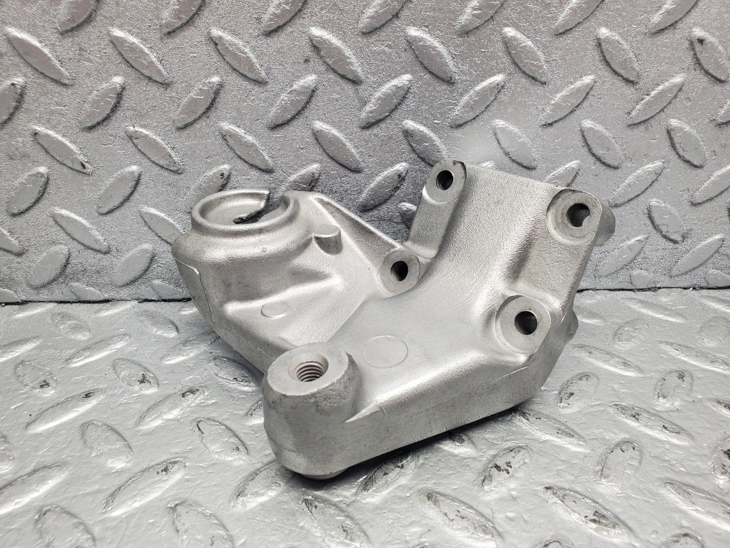 W126 Coupe engine mount bracket right used OEM