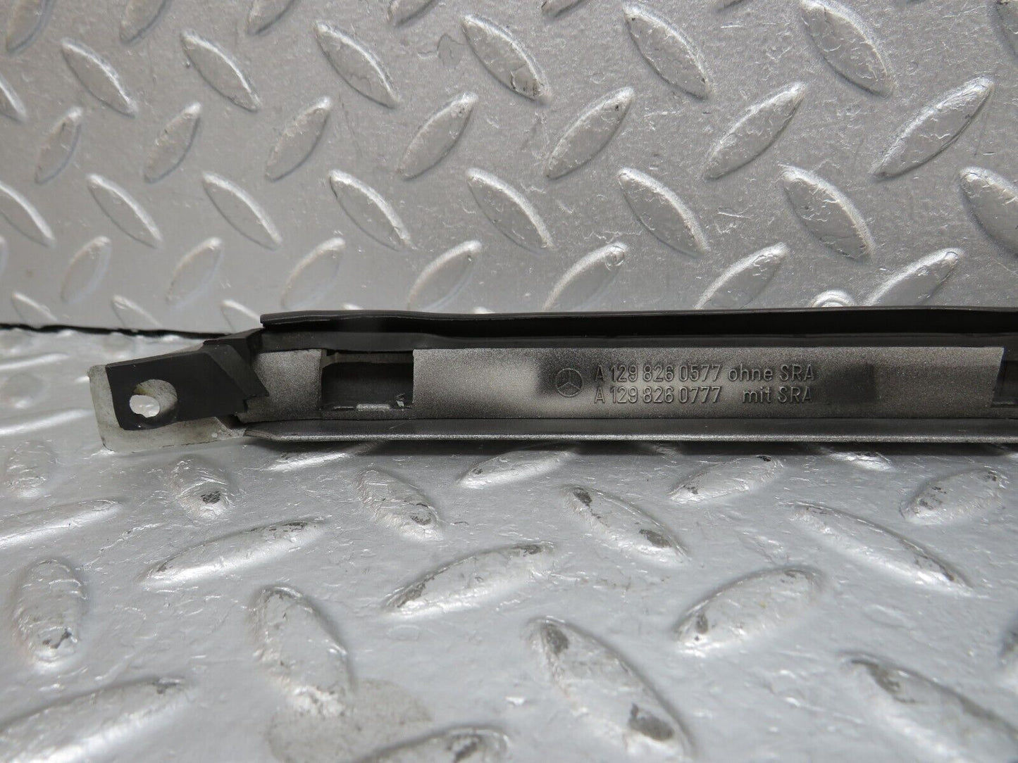 39695 Mercedes-Benz R129 320SL Coupe Left Headlight Lower Trim 1298260577 1298260777