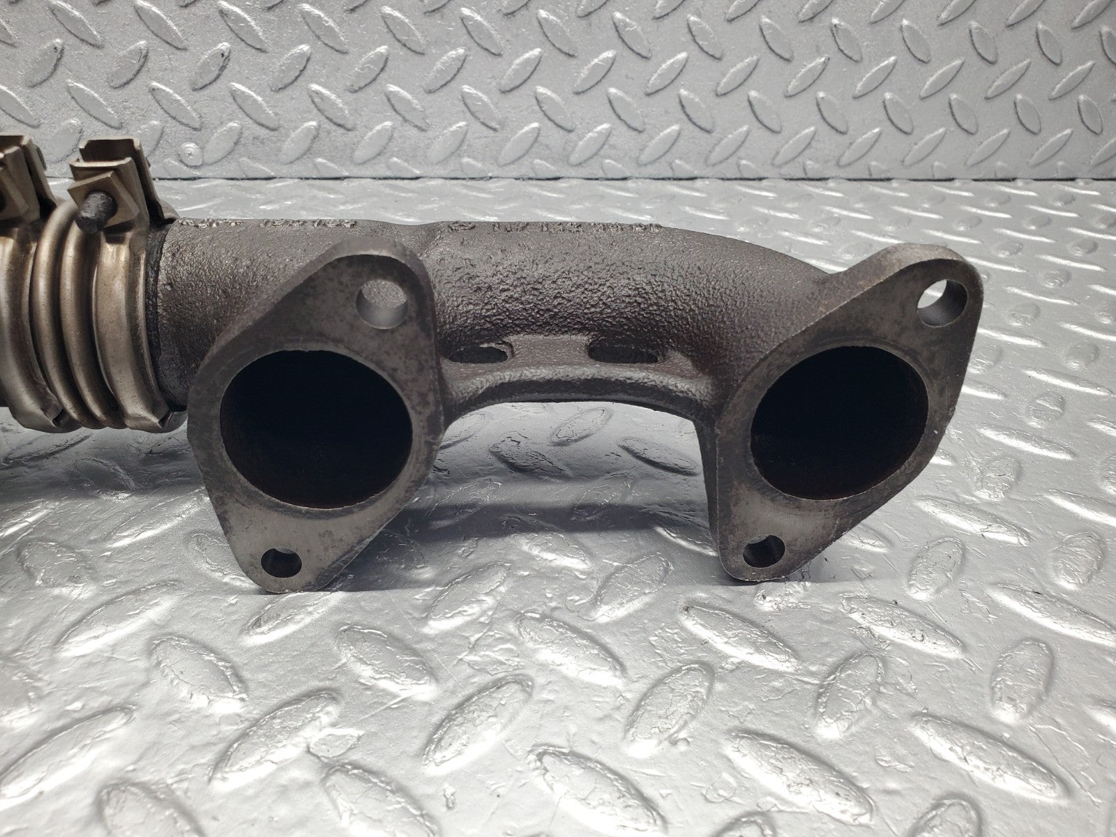 W126 Coupe exhaust manifold right used OEM