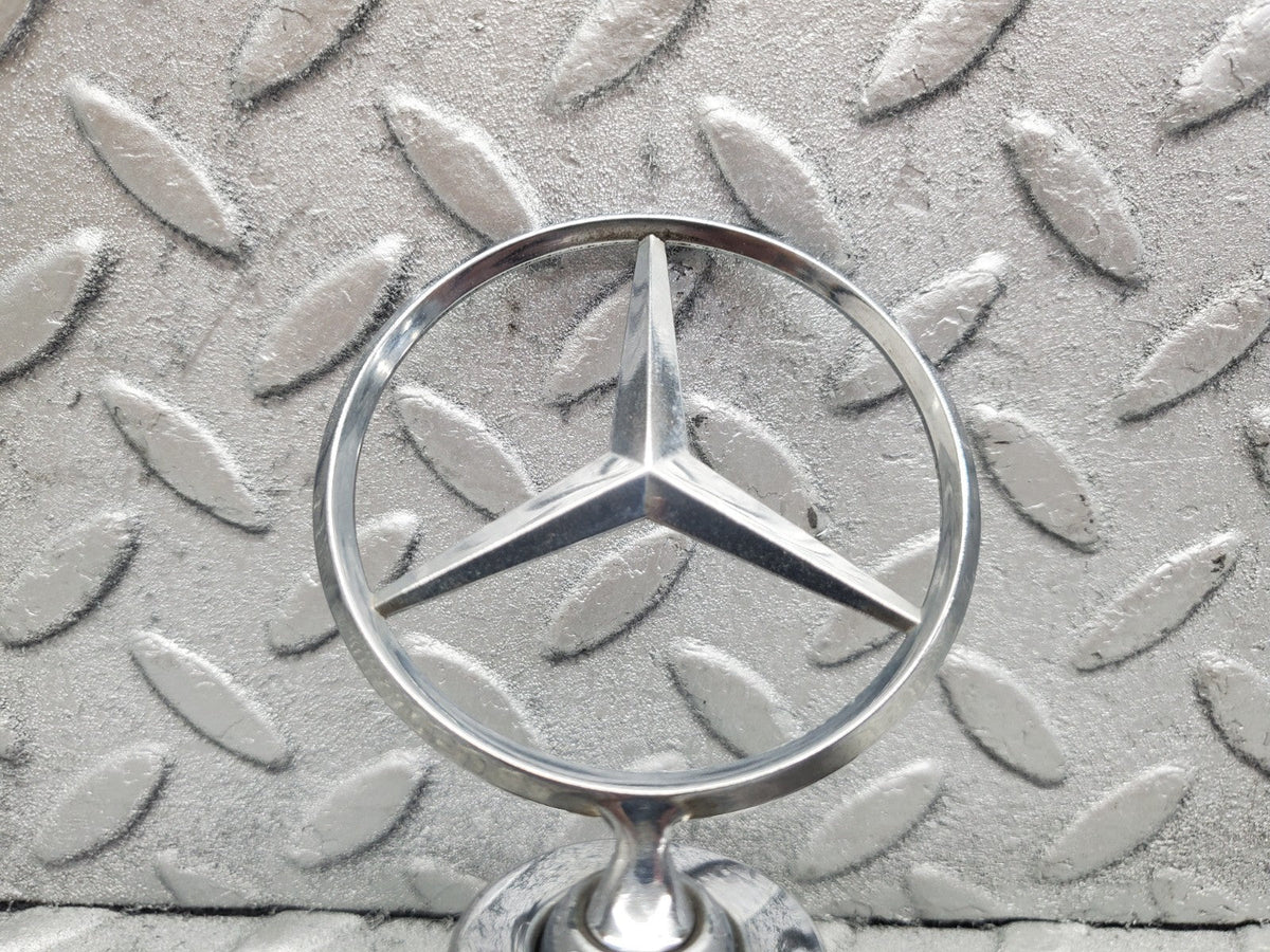 W201 Baby Benz front emblem badge used OEM