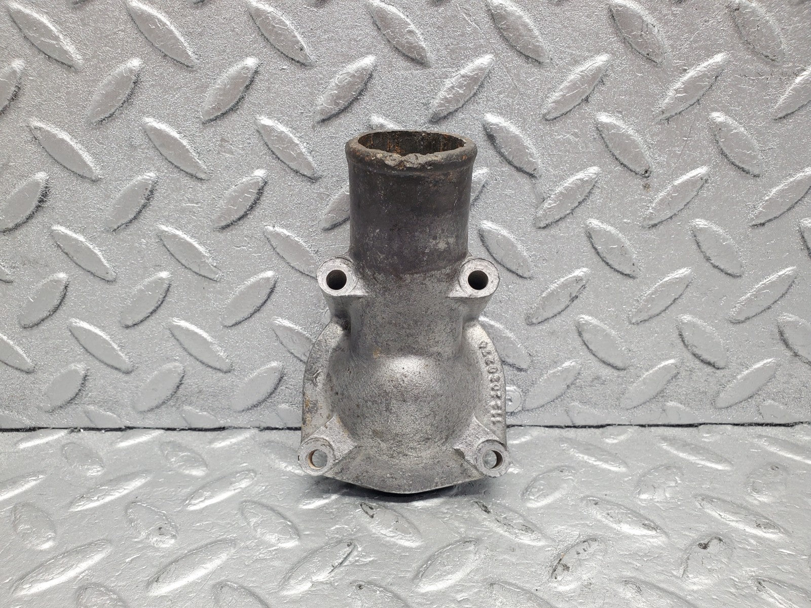 W112 thermostat housing used OEM
