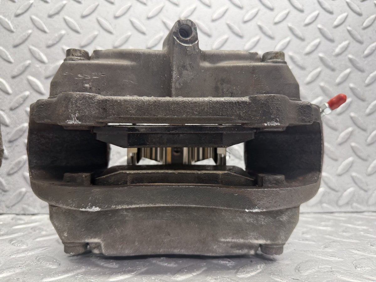 R230 front brake caliper right and left used OEM