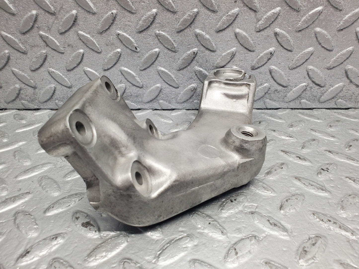 W126 Coupe engine mount bracket left used OEM