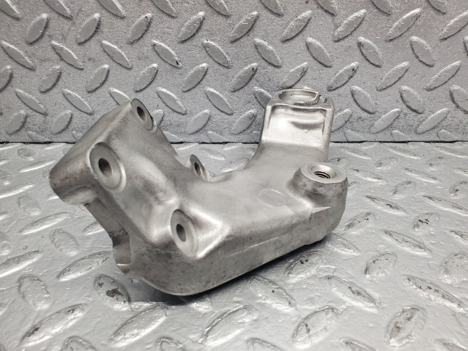 W126 Coupe engine mount bracket left used OEM