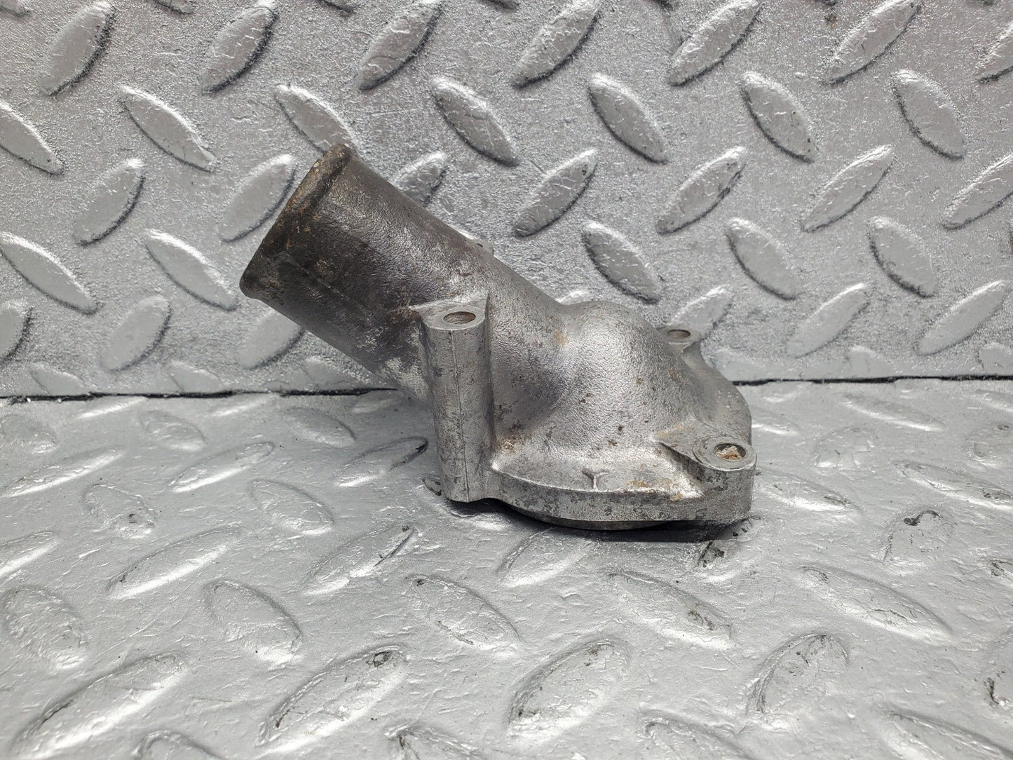 W112 thermostat housing used OEM
