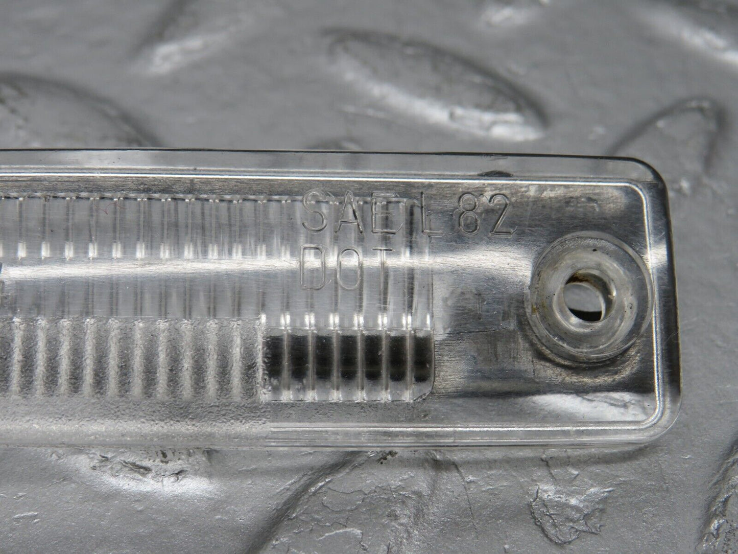 39136 Mercedes-Benz R107 500SL number Plate Light Lens 12981R4