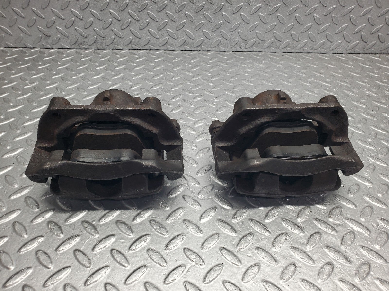 W124 Wagon front brake calipers with brackets used OEM