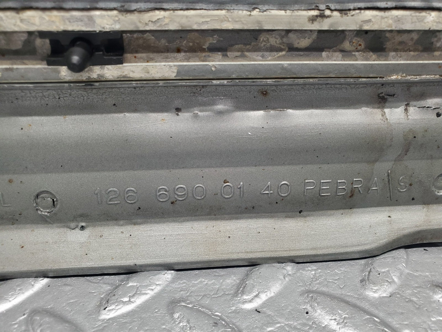 47077159