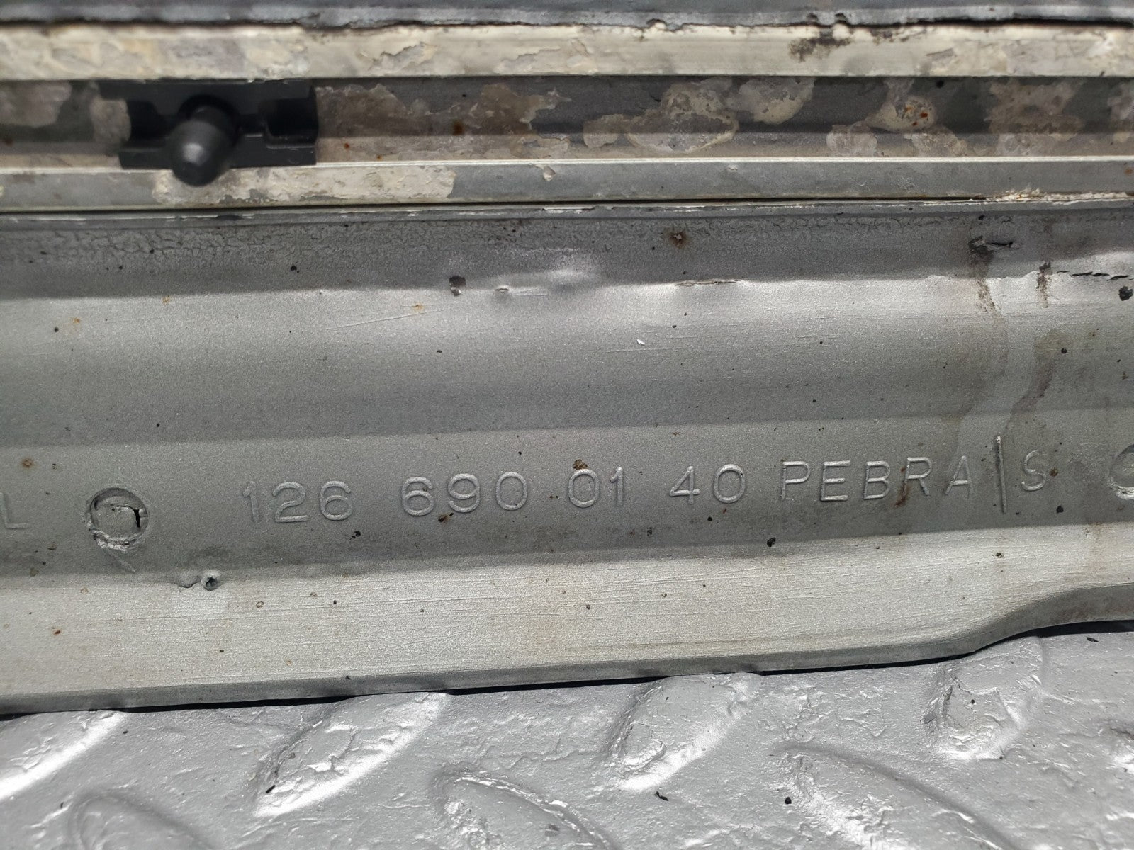 47077159