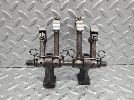 W112 rocker arm support with arm and shaft used OEM