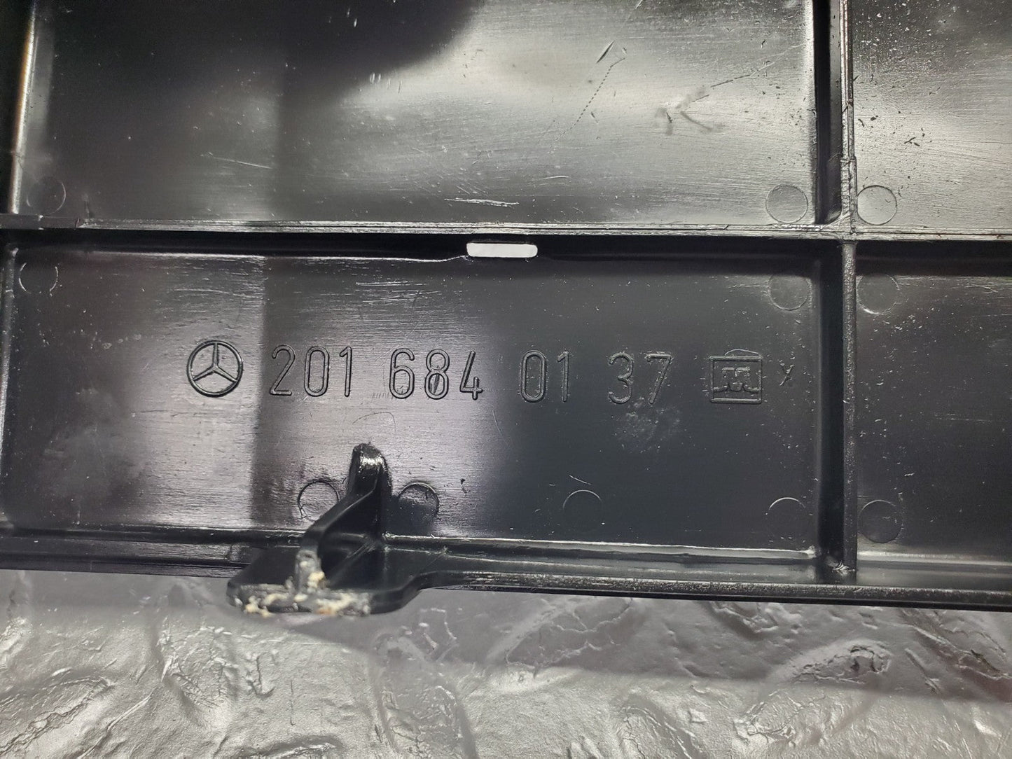 W201 Baby Benz front left cable channel cover used OEM