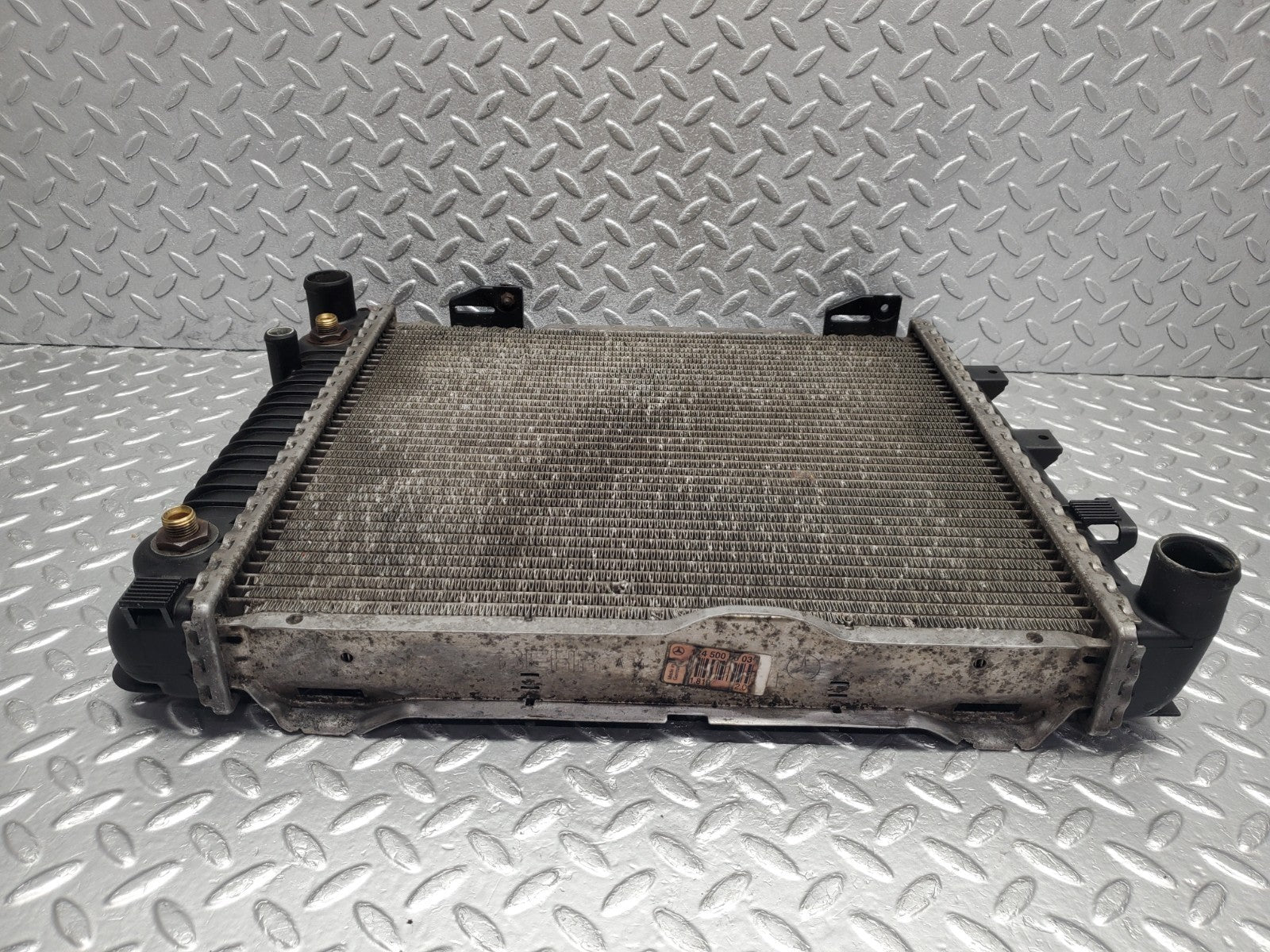 W124 Wagon engine coolant radiator used OEM