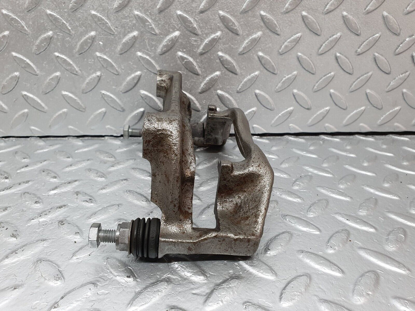 41612 Mercedes-Benz W124 200E Front Left Brake Caliper Bracket
