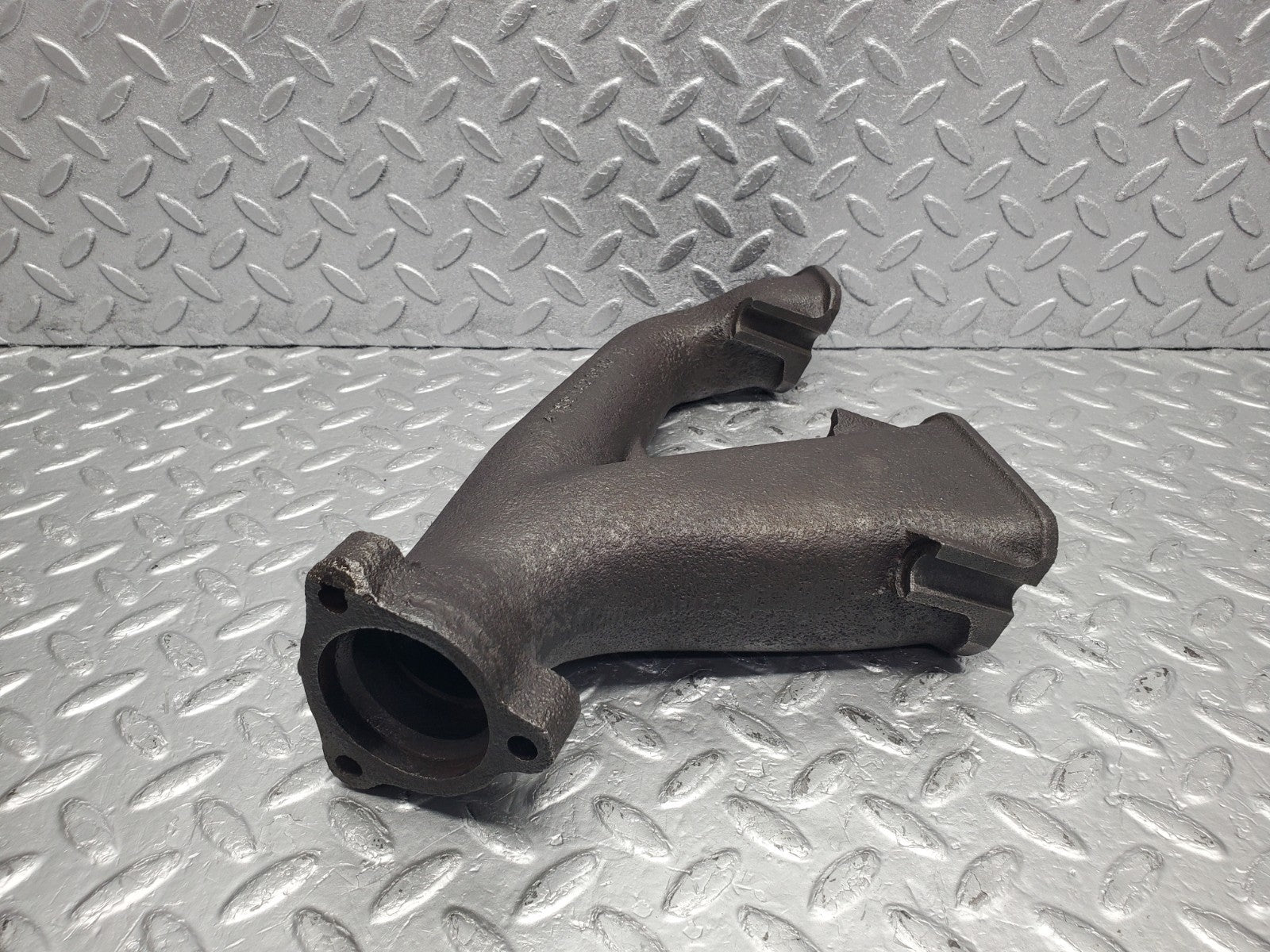W112 exhaust manifold 4-6 used OEM