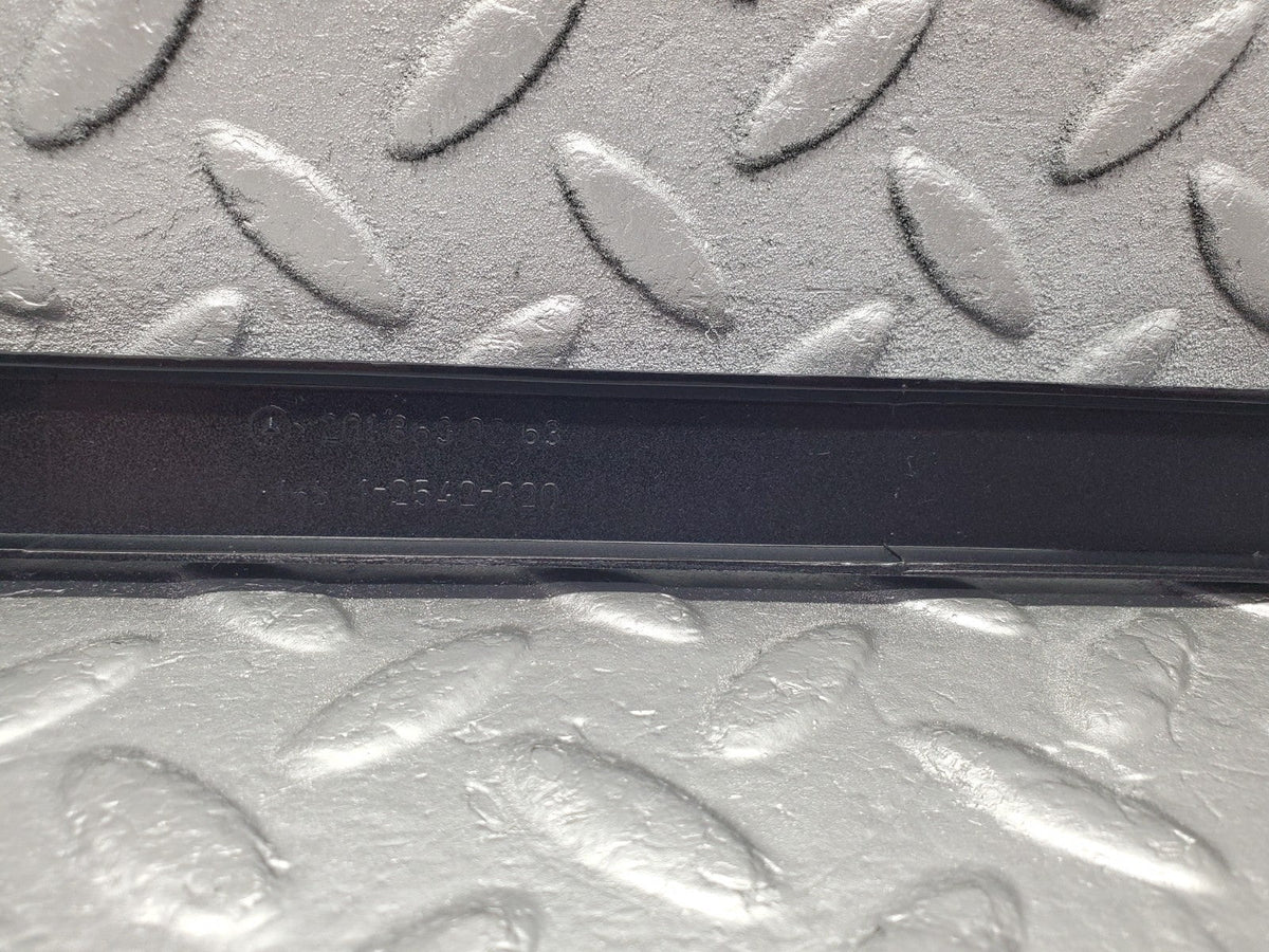 W201 Baby Benz under headlight trim right used OEM