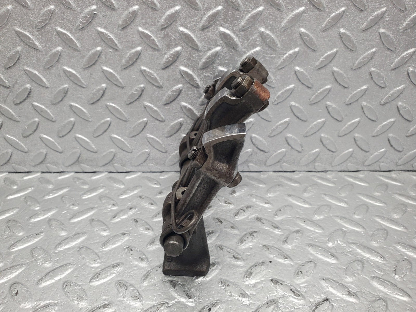 W112 rocker arm support with arm and shaft used OEM