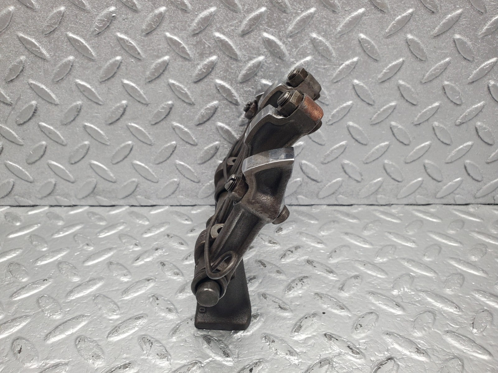 W112 rocker arm support with arm and shaft used OEM