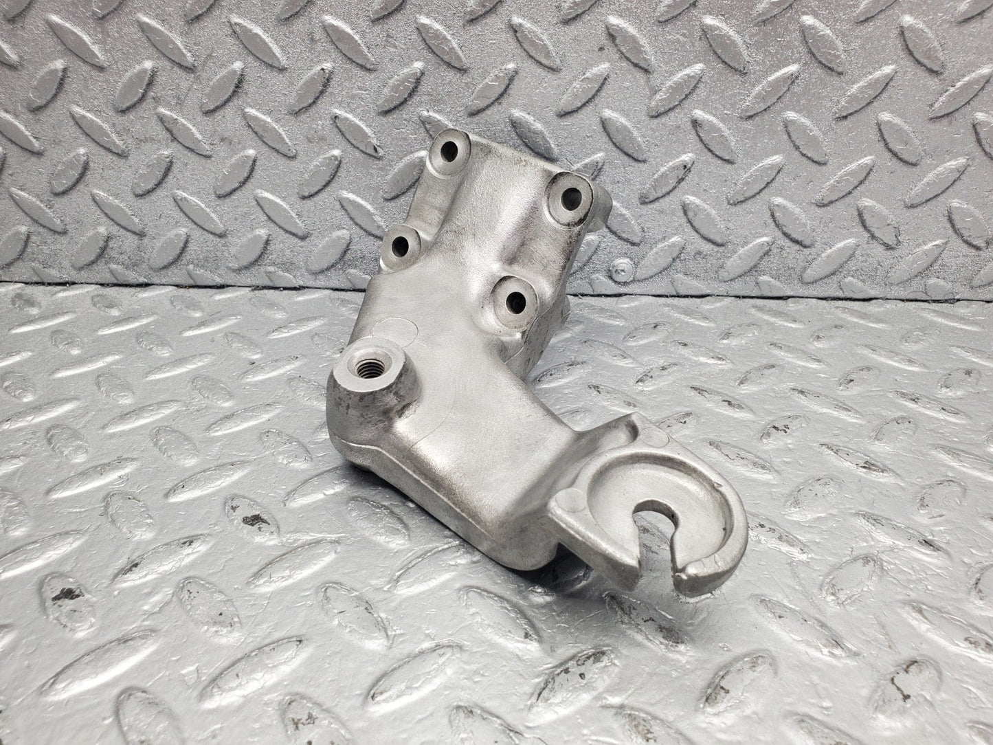 W126 Coupe engine mount bracket left used OEM