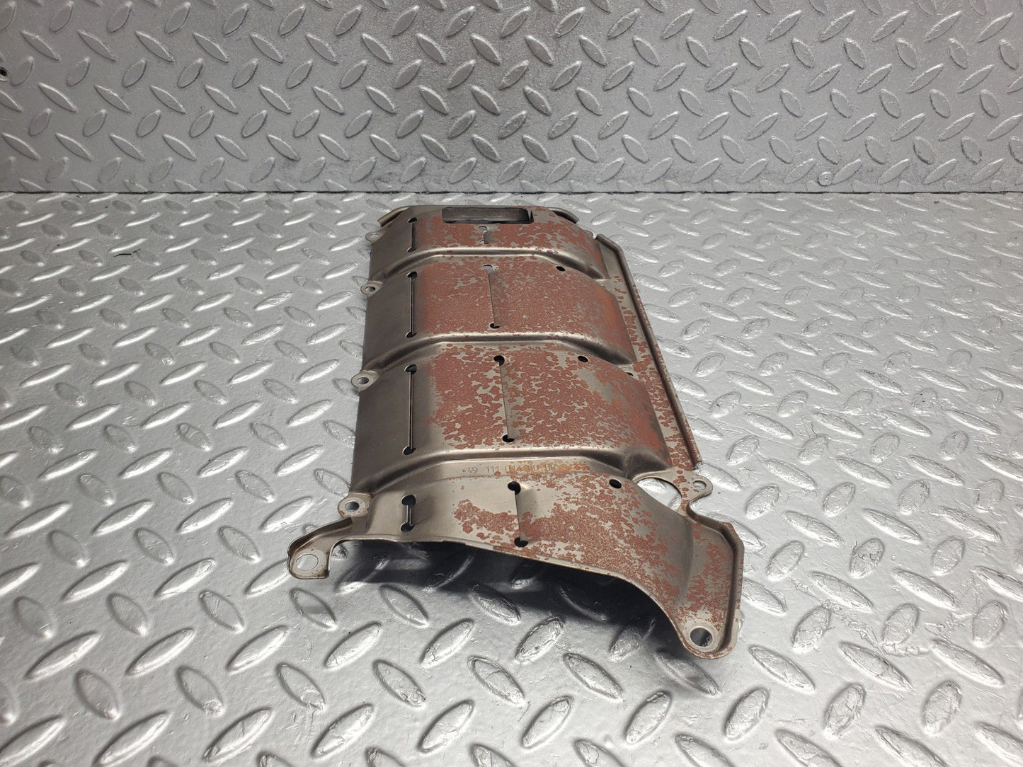 W124 Wagon baffle plate used OEM