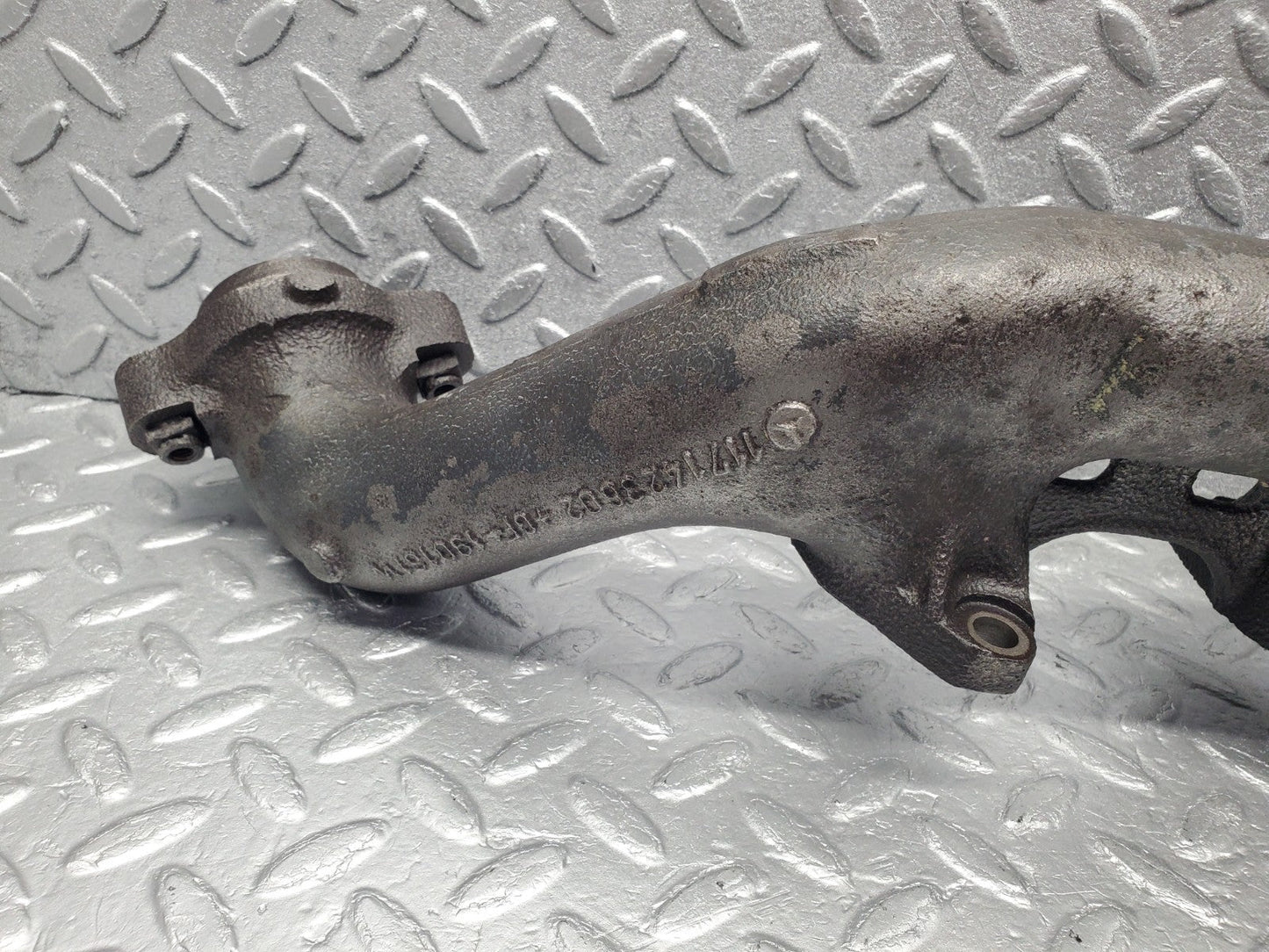 W126 Coupe exhaust manifold left used OEM